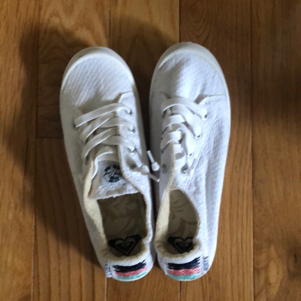 Super cute and comfy Roxy slip on tennis shoes. Worn once.